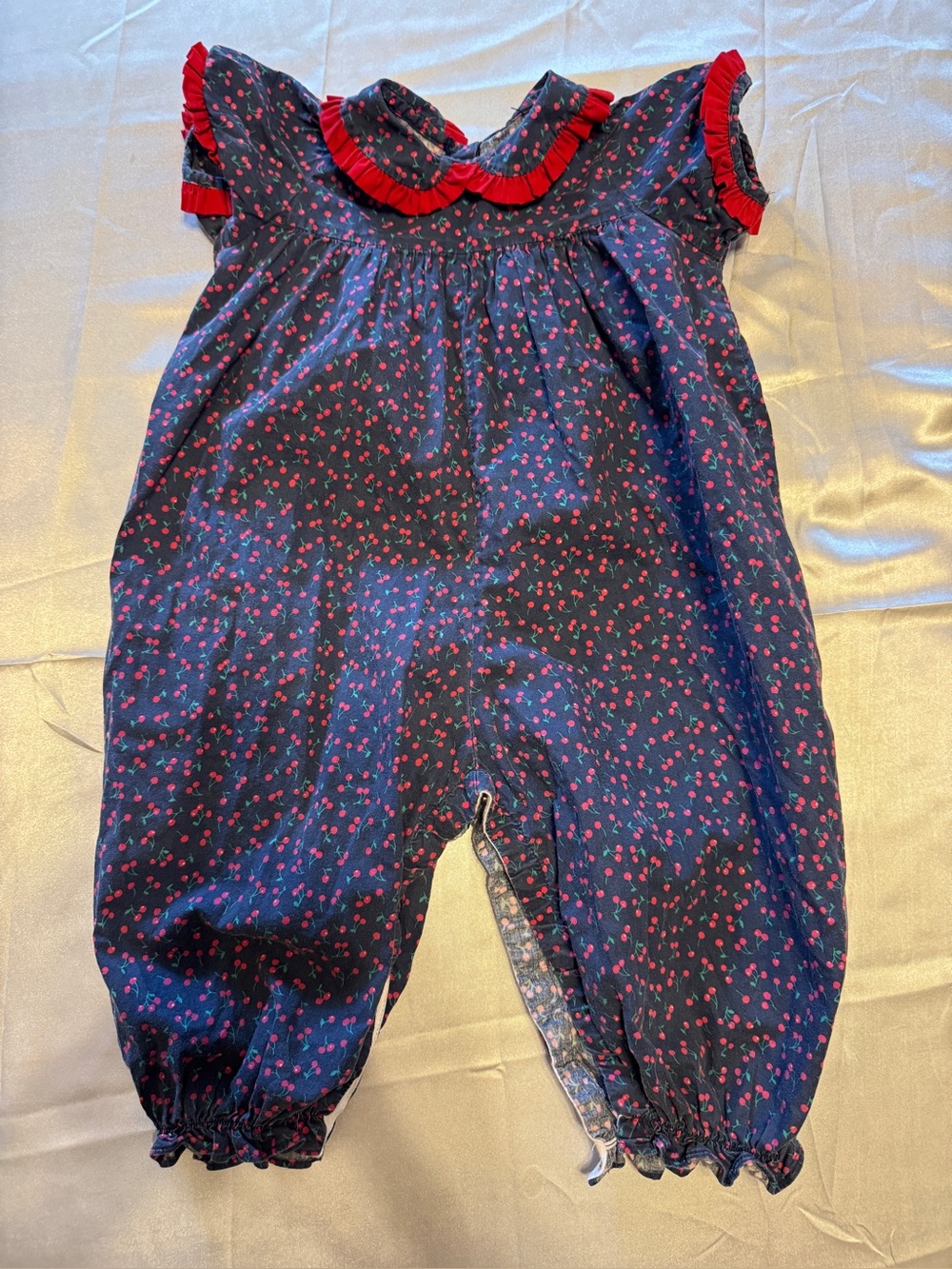 James & Lottie Girls Navy Cherry-Print Romper with Red Trim Size 18M
